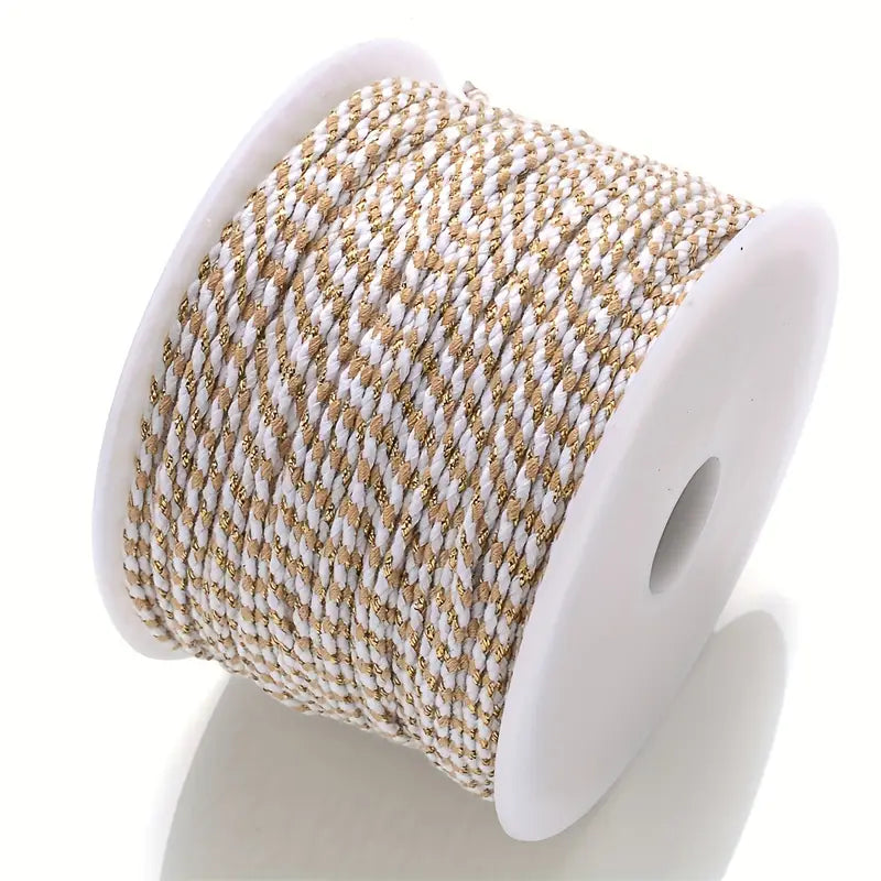 Spool of gold and white braided cable to make customisable necklaces