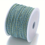 Spool of blue and gold braided cable to make customisable necklaces