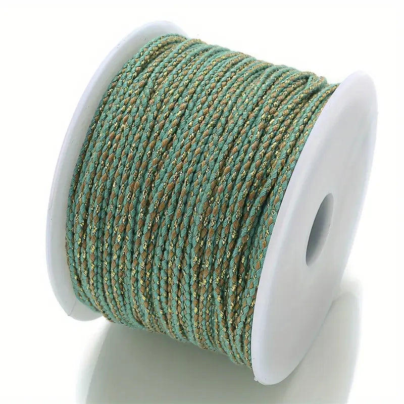 Spool of teal and brown braided cable to make customisable necklaces