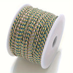 Spool of beige and teal braided cable to make customisable necklaces