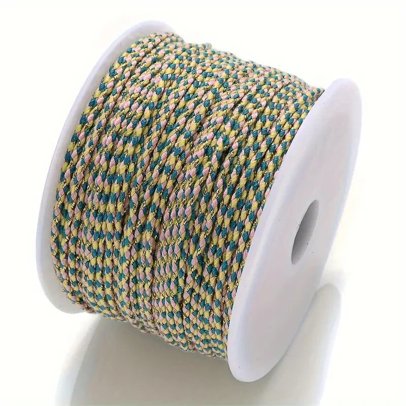 Spool of beige and teal braided cable to make customisable necklaces