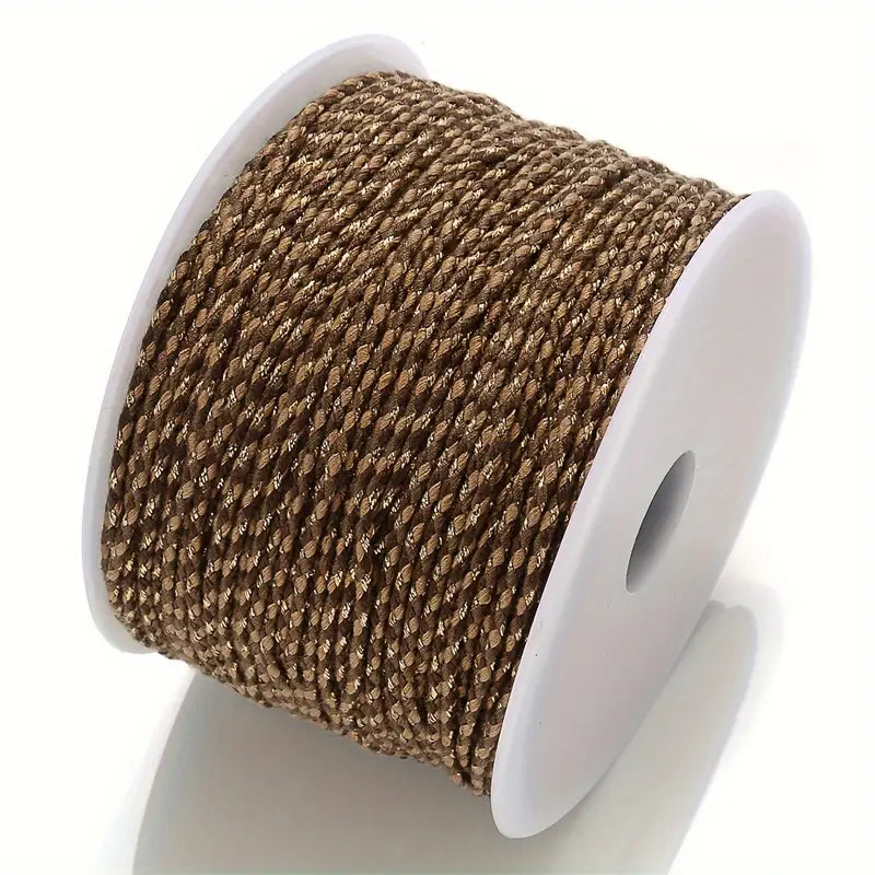Spool of brown and beige braided cable to make customisable necklaces