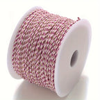 Spool of Pink and purple braided cable to make customisable necklaces
