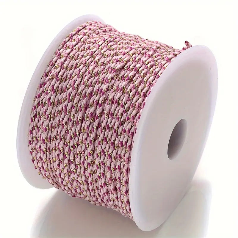 Spool of Pink and purple braided cable to make customisable necklaces