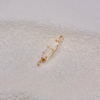 Gold wire-wrapped white clear crystal pendant