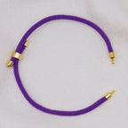 Purple rope necklace with gold clasps. The bracelet has a gap to cutomise.