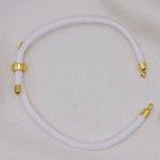 White rope necklace with gold clasps. The bracelet has a gap to cutomise.