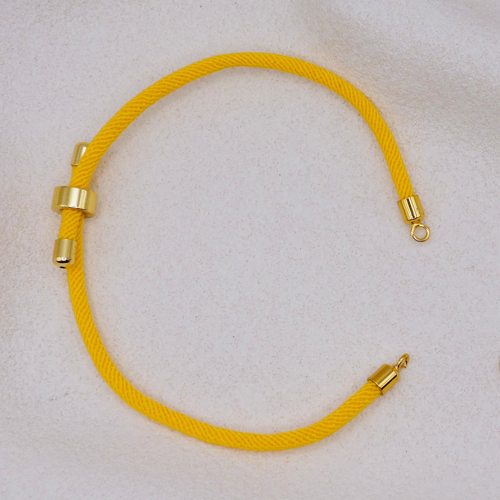 Yellow rope necklace with gold clasps. The bracelet has a gap to cutomise.