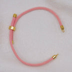 Pink rope necklace with gold clasps. The bracelet has a gap to cutomise.