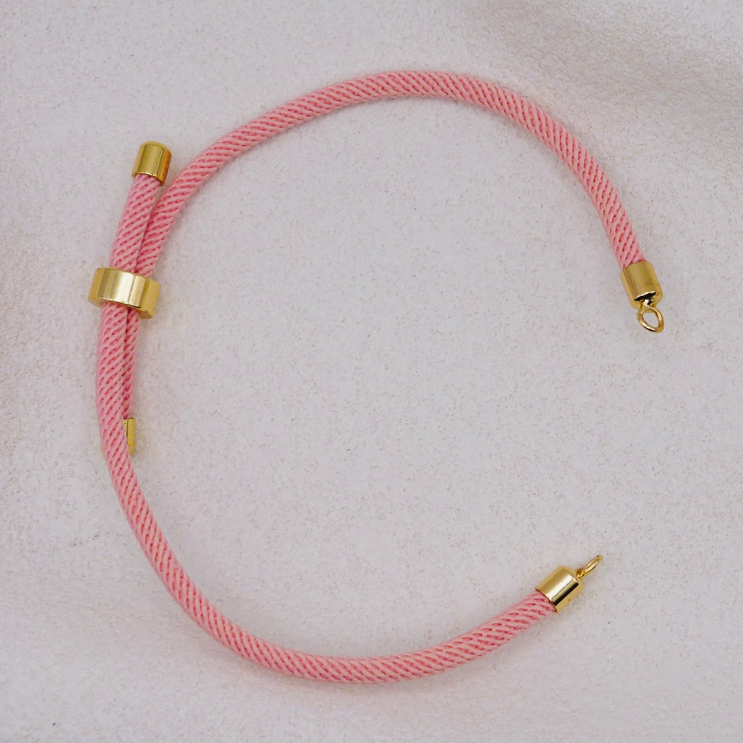 Pink rope necklace with gold clasps. The bracelet has a gap to cutomise.