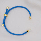 Blue rope necklace with gold clasps. The bracelet has a gap to cutomise.