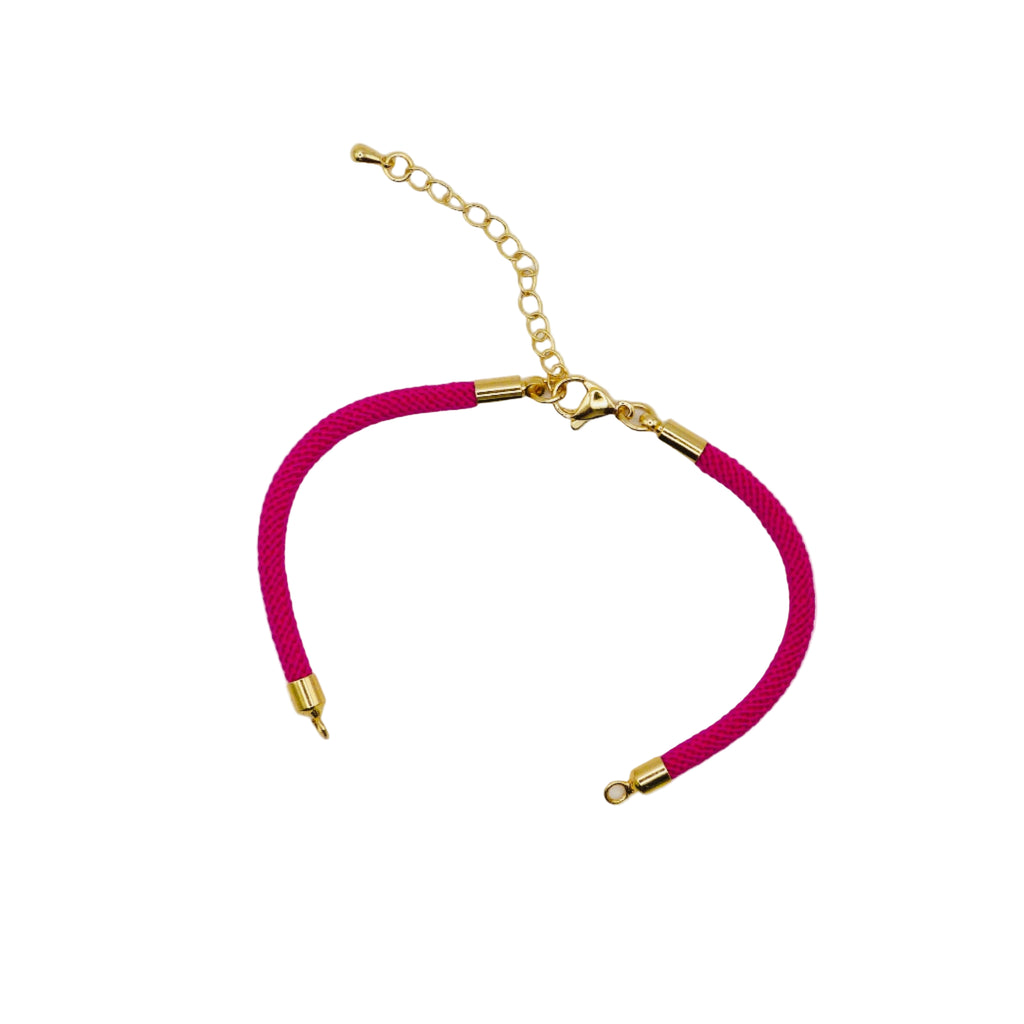 Waterpoof hot pink nylon bracelet with gold adjustable chain in stainless steel.