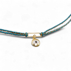 Turquise customisable braided choker necklace with gold charm pendant.