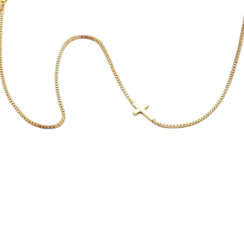 Gold chain necklace with a small cross charm in stainless steel.