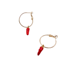 Waterproof gold hoop earrings with red chili pepper charms.