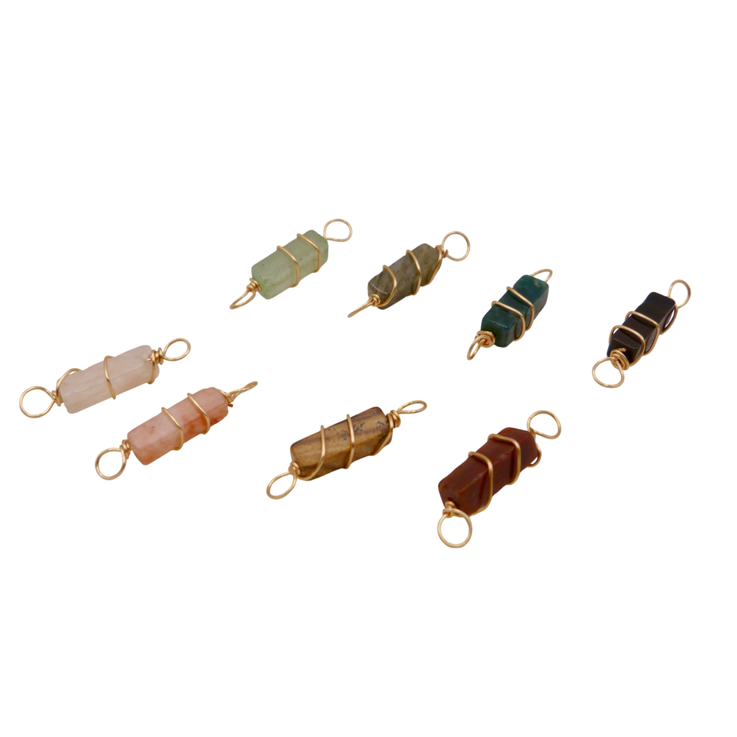 Set of rectangular crystal and gold wire wrapped pendants.