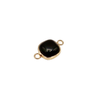 Waterproof gold frame jewelry connector with a black crystal.