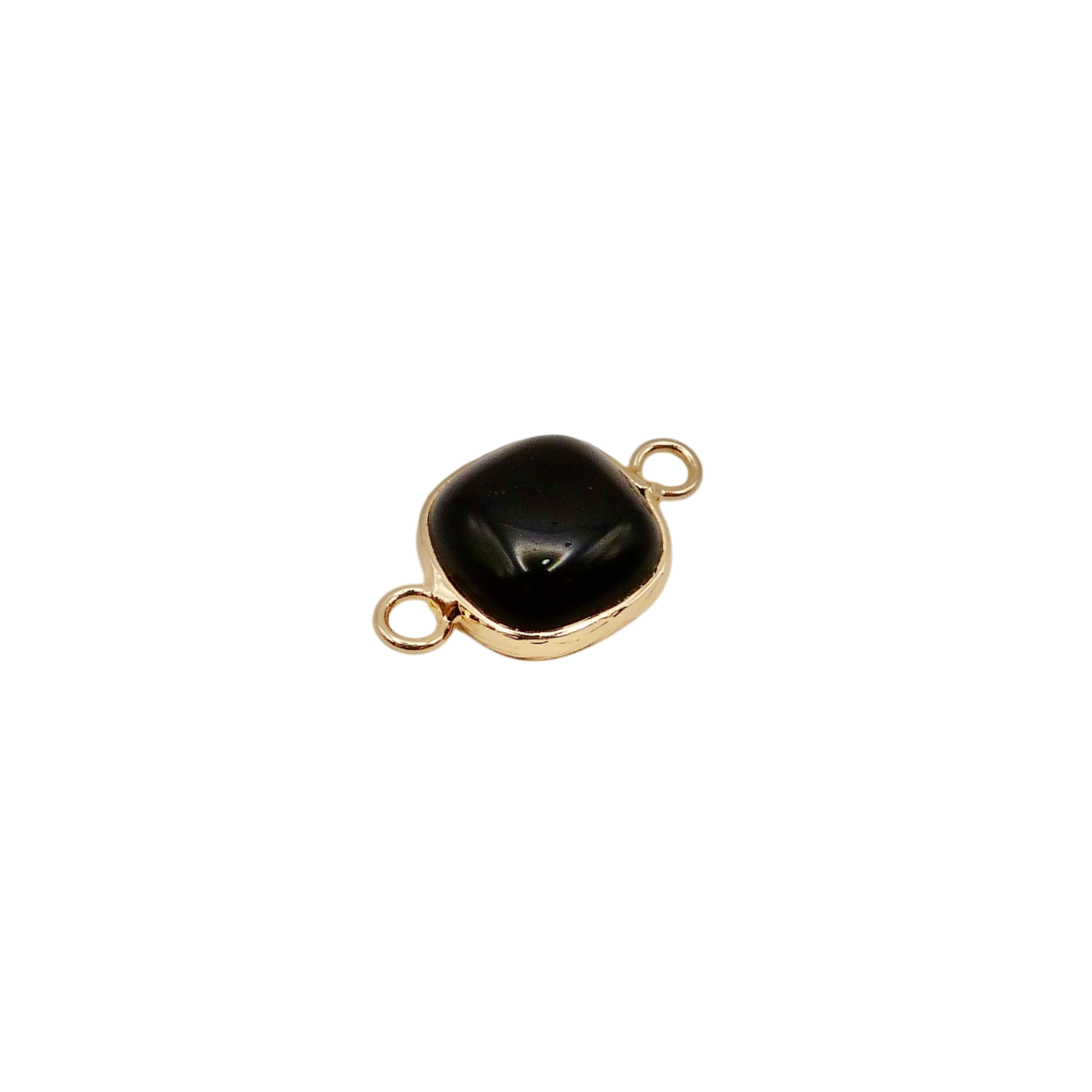 Waterproof gold frame jewelry connector with a black crystal.
