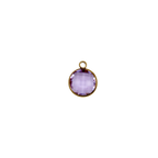 Purple glass charmwith gold frameon a white background.