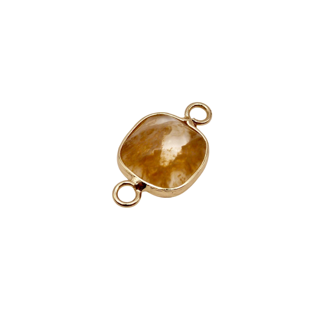 Waterproof gold frame jewelry connector with a bronze crystal.