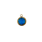 Blue circular glass charm with waterproof gold frame.