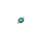 Waterproof gold frame jewelry connector with a sky blue crystal.