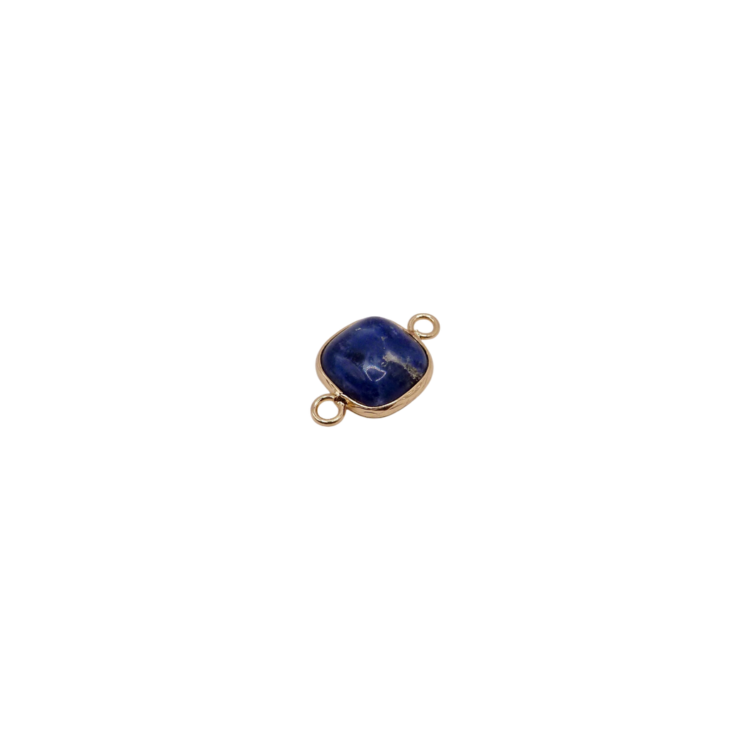 Waterproof gold frame jewelry connector with a navy blue crystal.