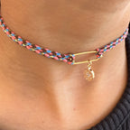 Customisable braided choker necklace with gold charm pendant.