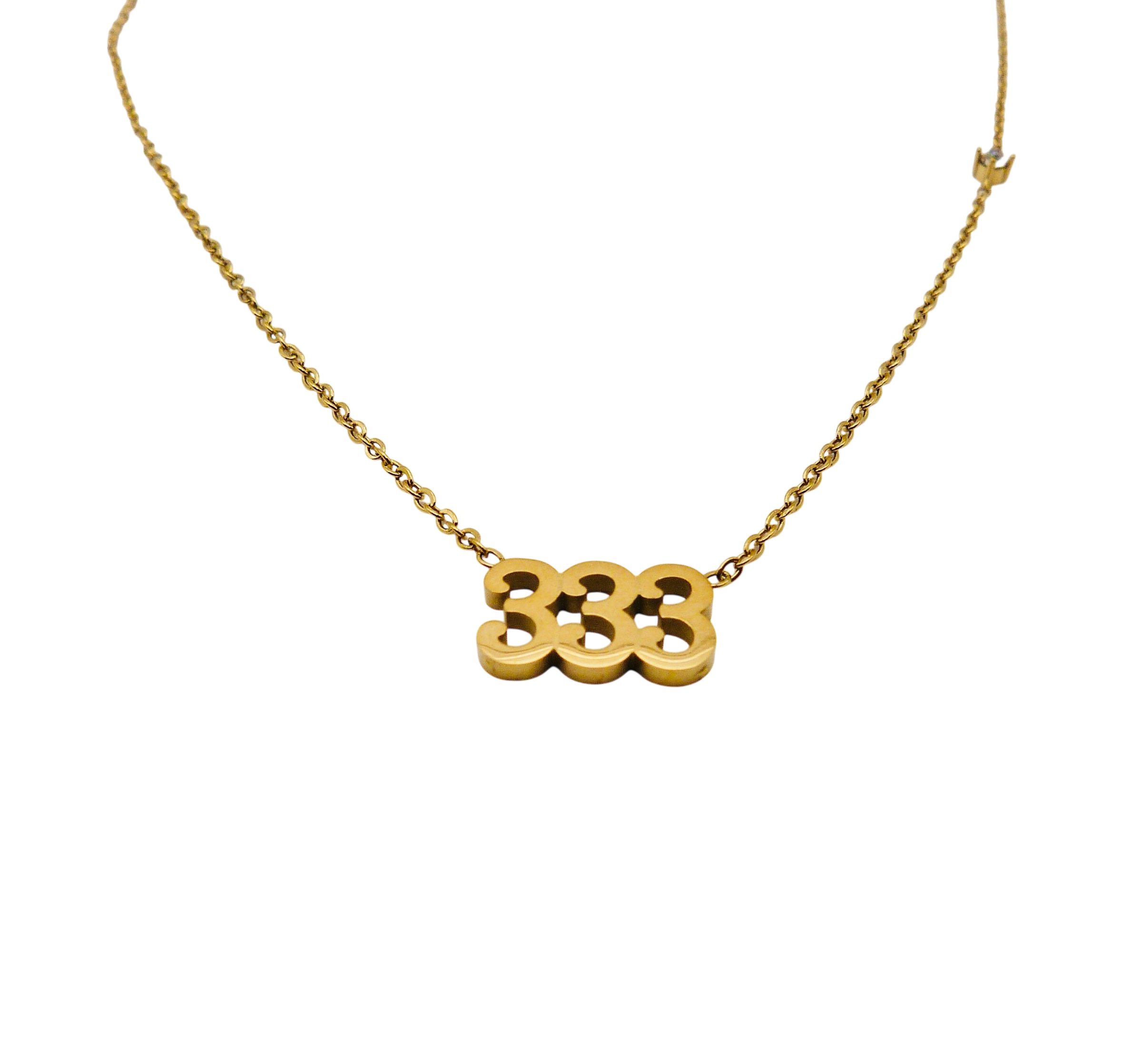 Gold necklace with the number '333' and small stone in stainless steel.