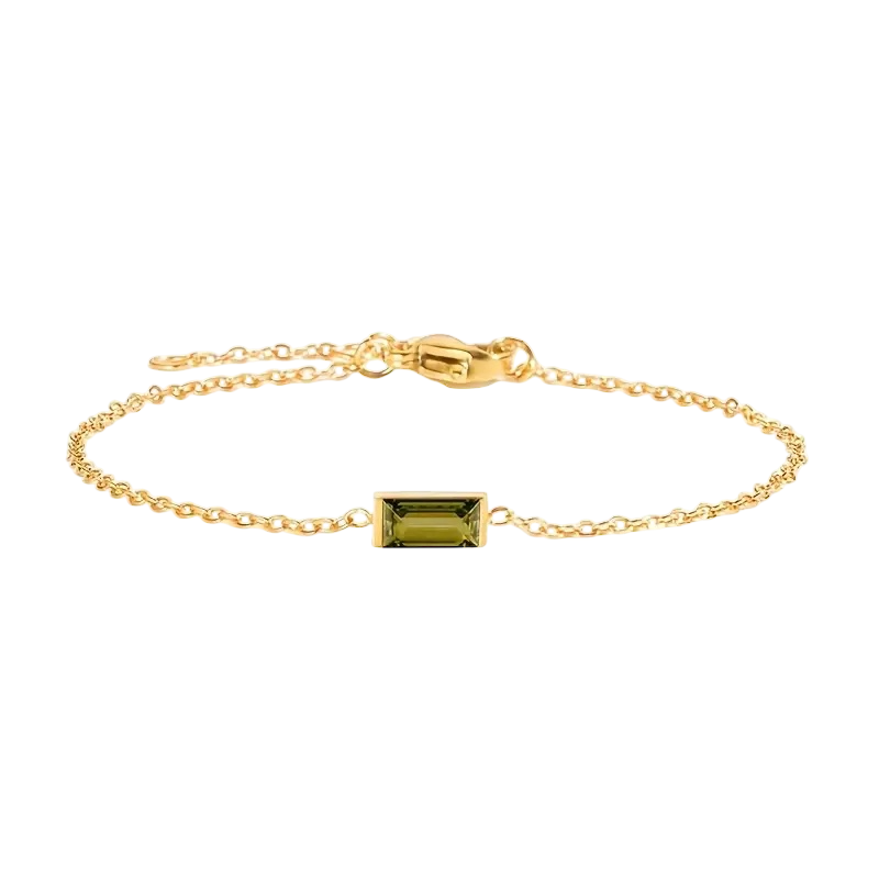 Waterproof gold bracelet with a green rectangular glass in stainless steel.
