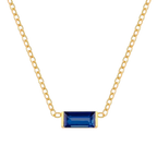 Waterproof chain gold necklace with a blue glass stone pendant.