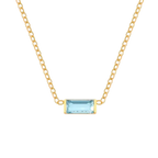 Waterproof chain gold necklace with a light blue glass stone pendant.